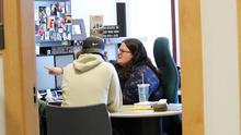 librarian working with student